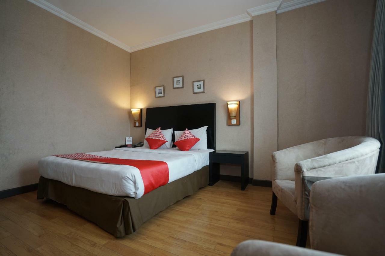 Capital O 1128 Hotel Imara Palembang Eksteriør billede