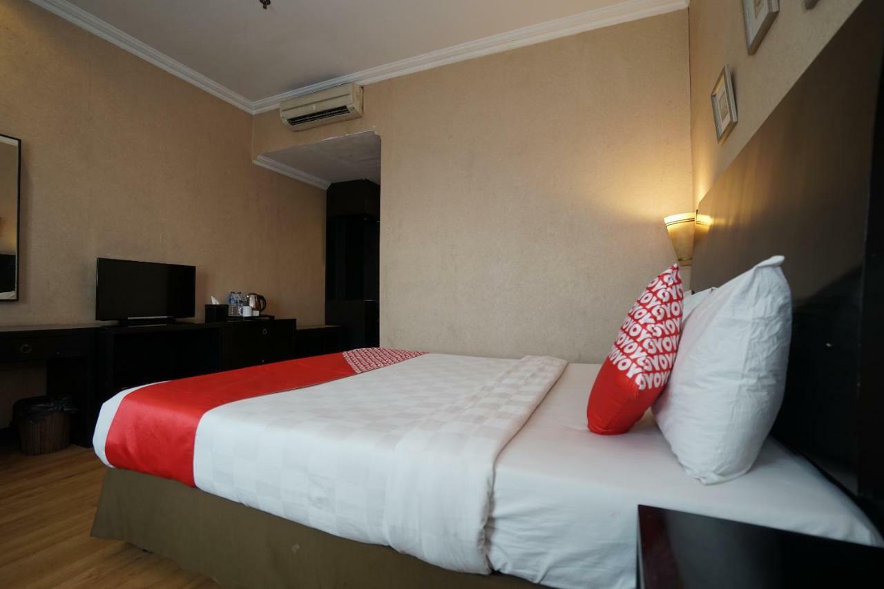 Capital O 1128 Hotel Imara Palembang Eksteriør billede