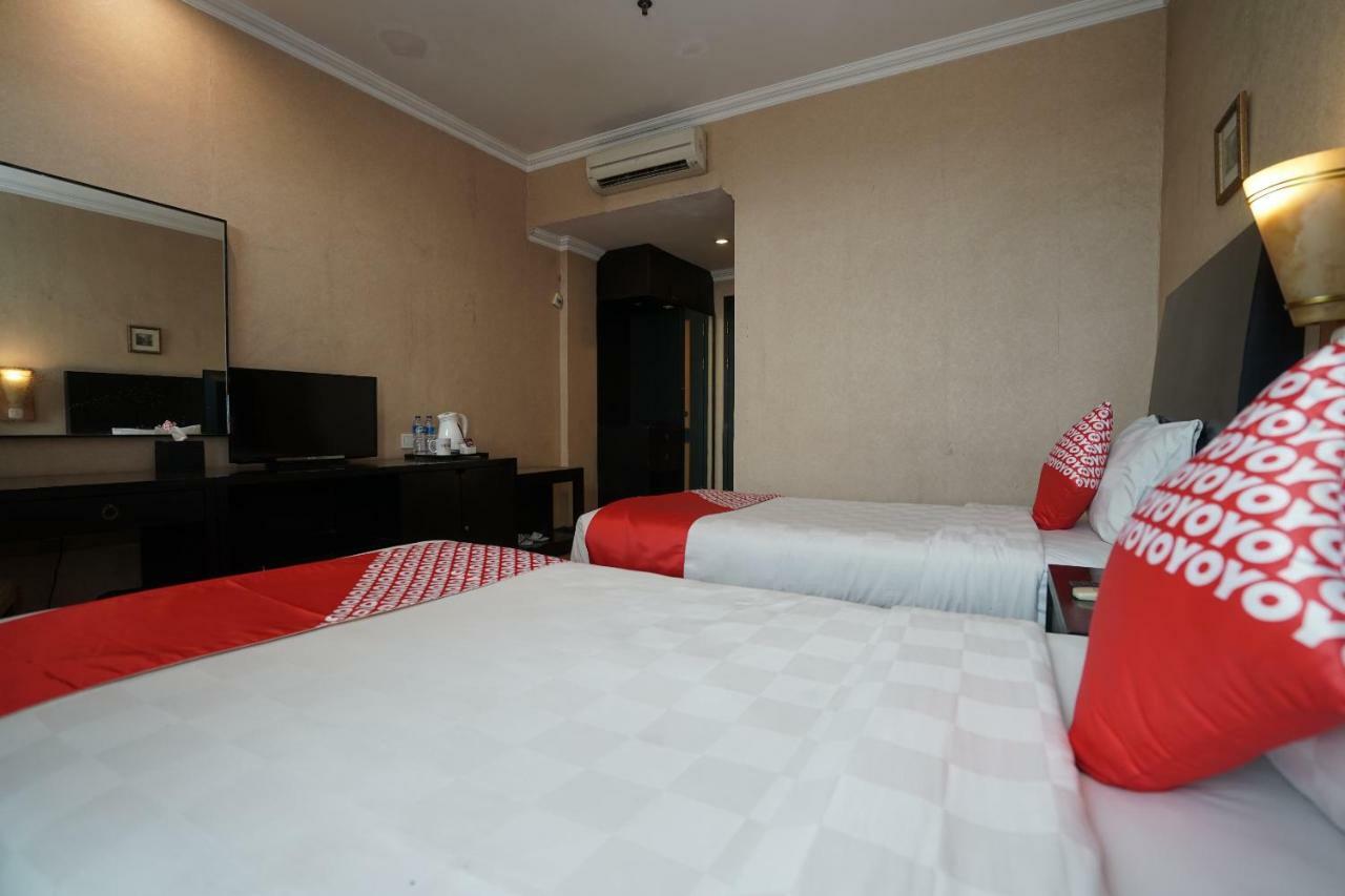 Capital O 1128 Hotel Imara Palembang Eksteriør billede