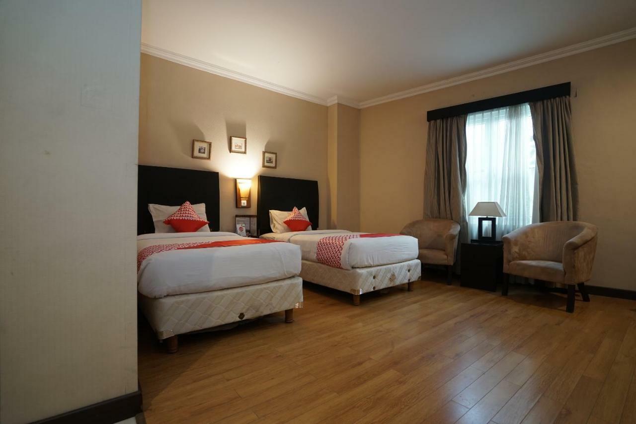 Capital O 1128 Hotel Imara Palembang Eksteriør billede
