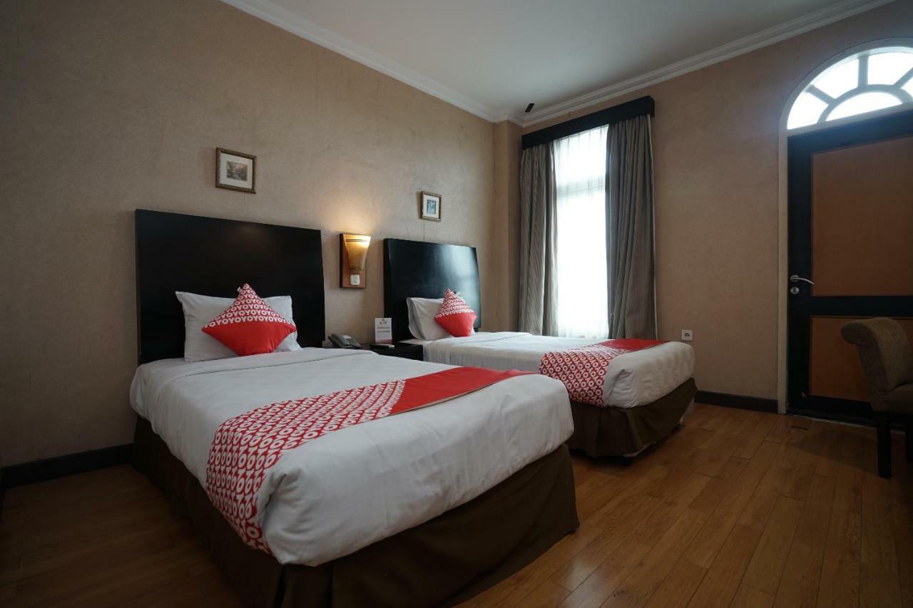 Capital O 1128 Hotel Imara Palembang Eksteriør billede