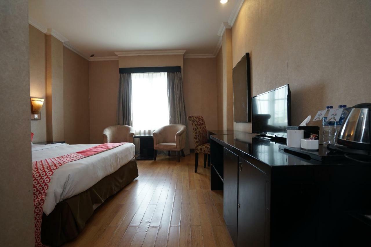 Capital O 1128 Hotel Imara Palembang Eksteriør billede