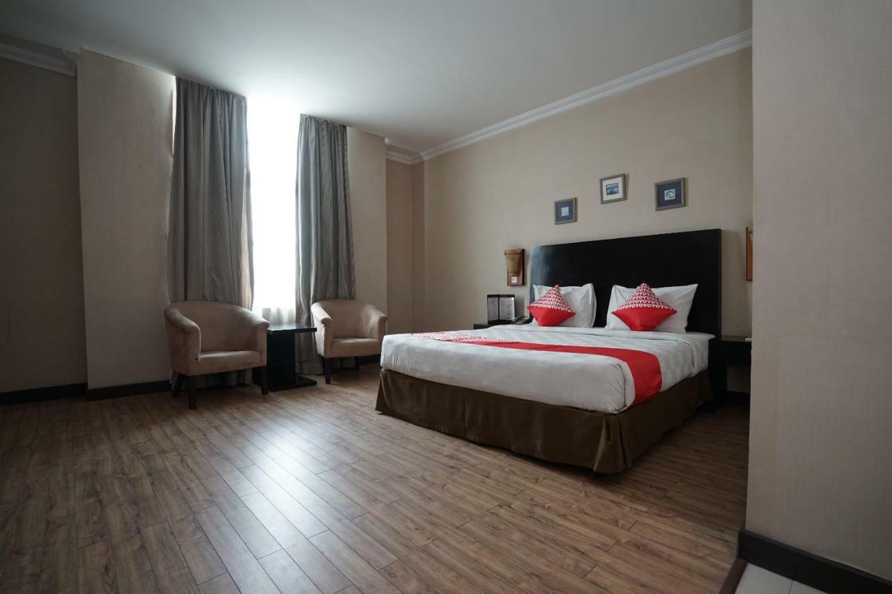 Capital O 1128 Hotel Imara Palembang Eksteriør billede