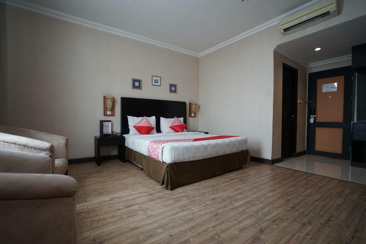 Capital O 1128 Hotel Imara Palembang Eksteriør billede