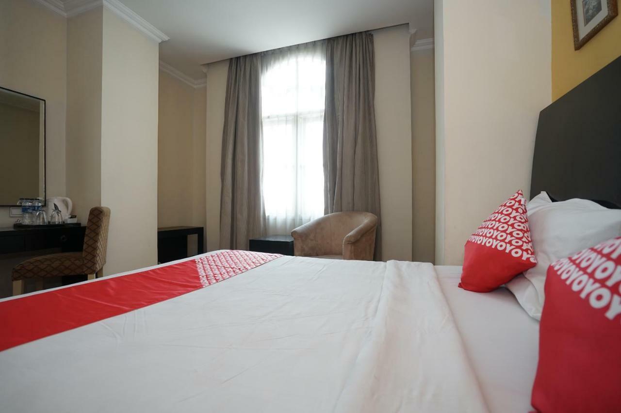 Capital O 1128 Hotel Imara Palembang Eksteriør billede