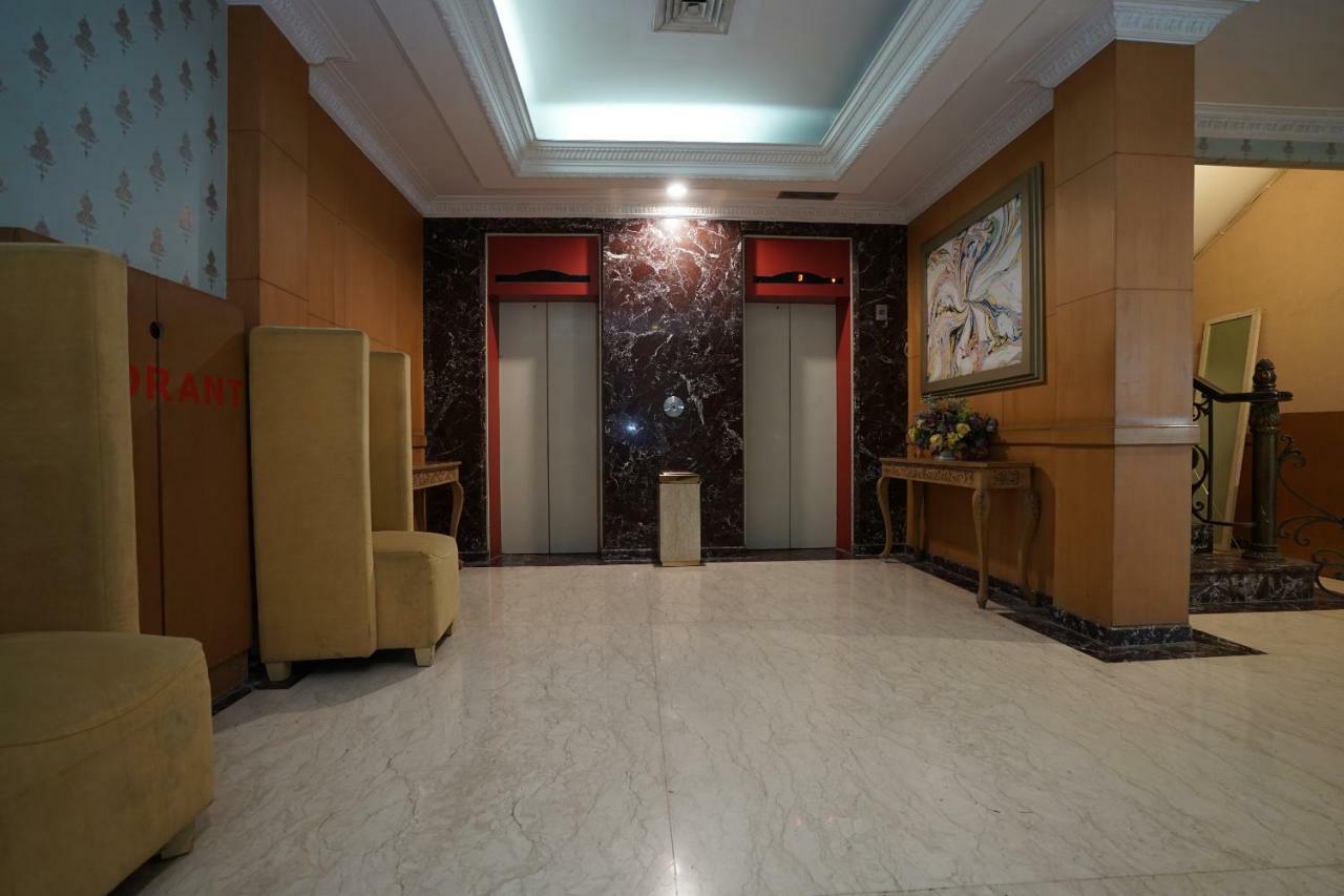 Capital O 1128 Hotel Imara Palembang Eksteriør billede